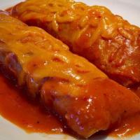 Enchiladas Rojas Cheese · (2) corn tortillas dipped in a red sauce, rolled and filled with cheese, topped with melted ...