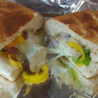Veggie Sub · Filled with mushroom, onion, green peppers, banana peppers, lettuce, tomato, provolone chees...