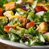 House Salad · Crisp lettuce mix generously topper with tomato, provolone cheese, banana peppers, pepperoni...