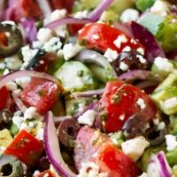 Greek Salad · Crisp, lettuce mix generously topped with feta cheese, tomato black olive, green peppers, ba...