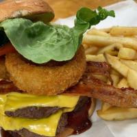 Monster Burger  · Two patties, two onion rings, two pieces of bacon,  and BBQ sauce