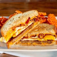The Eggy · Sausage with fried eggs and American Cheese on grilled bread of your choice