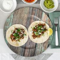 Tacos · Meat: chicken, steak or shrimp (comes with two soft tacos). Contains Wheat, Soy, Gluten and ...