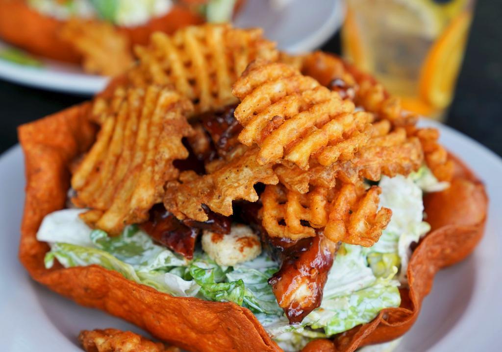 Bbq Chicken Potato Crisp · Grilled barbecue chicken breast romaine lettuce tomatoes, cucumber and cheese toasted potato toasted with our ranch dressing.