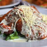 Almond Chicken · Our specialty breaded chicken with almond crust fried to perfection served with lemon sun dr...