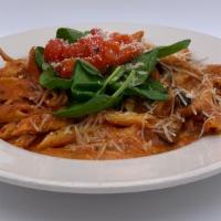 Penne Verdura · Made With Roasted Red Pepper & Pesto Assorted Vegetables & Fresh Spinach Topped With Our Che...