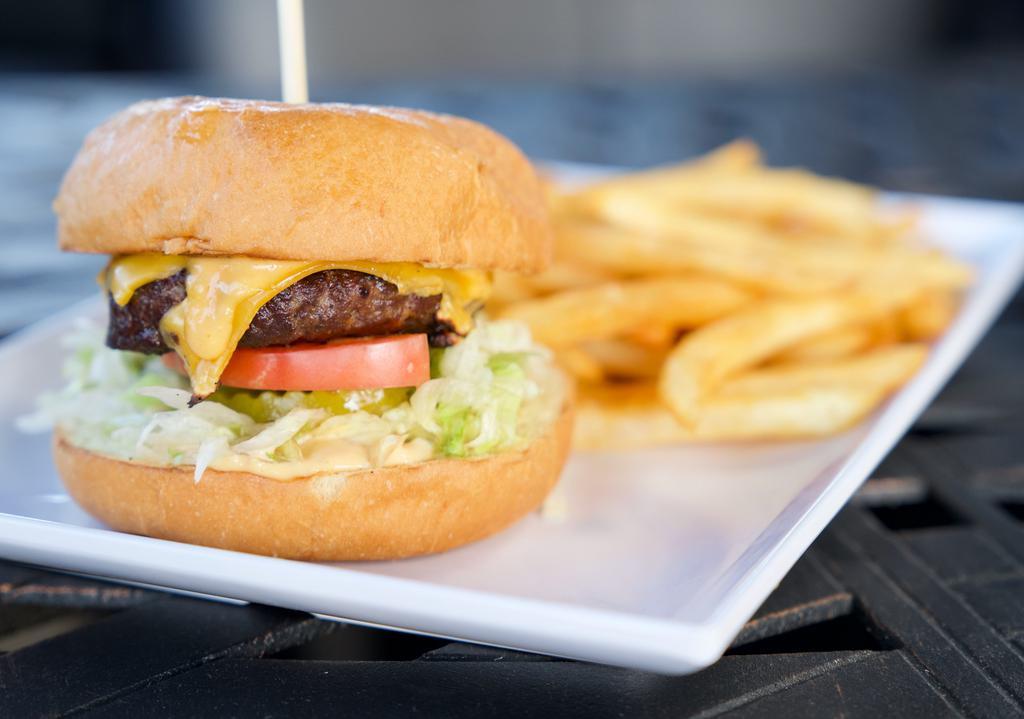 Cheese Burger · 1/2 lb. grilled patty, American cheese, tomatoes, pickles, lettuce and burger sauce.