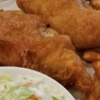 Fish And Chips · 8 oz. portion of haddock, hand-battered and fried. Served with lemon wedge and homemade tart...