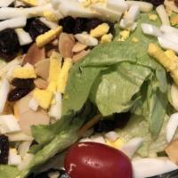 Firehouse Salad Supreme · Fresh greens, mixed cheese, hard-boiled egg, chopped mixed nuts, raisins, and tomatoes. Serv...