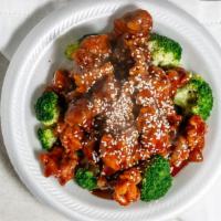 Sesame Chicken · Served with white rice. chunks of deep-fried chicken cooked with broccoli and sprinkle of se...