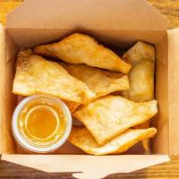 Crab Rangoon · (6) Giant deep-fried wontons filled with a mixture of crab meat and cream cheese, served wit...