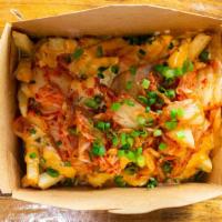 Kimchi Fries · Fries top with Cheddar cheese, kimchi, onion, jalapeno, cilantro served with homemade spicy ...