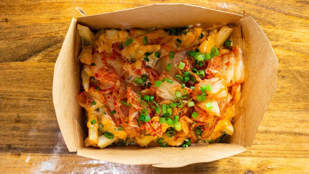 Kimchi Fries · Fries top with Cheddar cheese, kimchi, onion, jalapeno, cilantro served with homemade spicy mayonnaise.