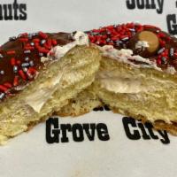 Buckeye Special Yeast Donut · Yeast donut filled with our peanut butter cream with chocolate icing, red & silver sprinkles...