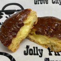 Banana Creme Donut - Chocolate Frosted · Yeast donut filled with banana cream pie filling topped with chocolate icing