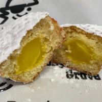 Lemon Filled Yeast Donut · Yeast donut filled with lemon jelly coated in powdered sugar