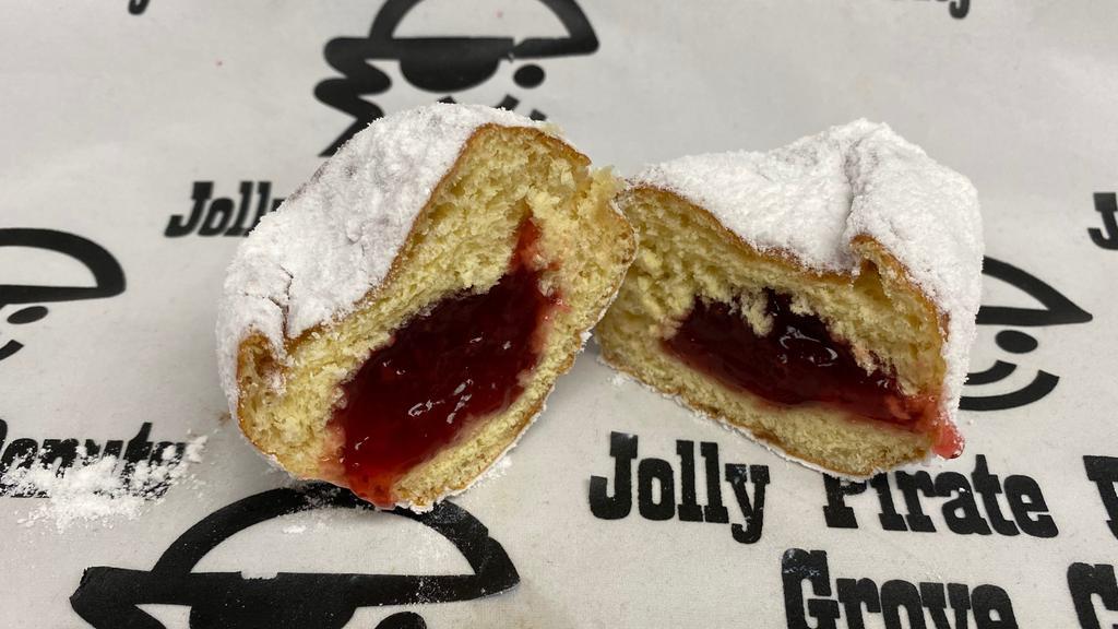 Cherry Filled Yeast Donut · Yeast donut filled with cherry jelly coated in powdered sugar