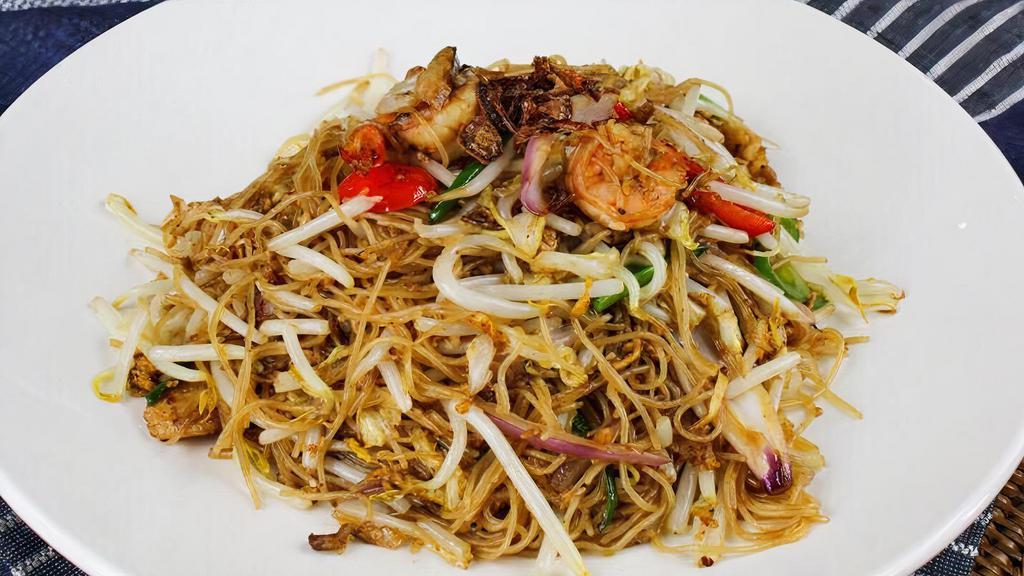 Rice Noodles With Salted Fish · Stir fried rice noodles with salted fish, chicken, shrimp, and bean sprouts.