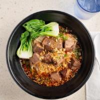 Chongqing Beef Noodle · House noodle in Chongqing style spicy broth with tender braised beef, Shanghai Choy, sesame ...