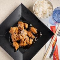 Sesame Chicken · Lightly breaded chicken breast in sesame sauce with sesame seeds.