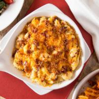 Mac 'N Cheese · A delicious blend of cheeses and tender shell pasta topped with toasted Parmesan and seasone...