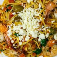 Greek Pasta · Linguini, sauteed in olive oil with spinach, bruschetta and Greek olives, topped with almond...