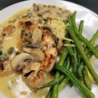 Piccata Di Pollo · Grilled chicken breast, served with capers, mushrooms and in our lemon butter garlic sauce.
