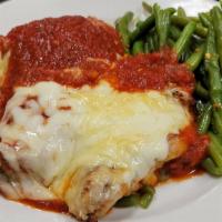 Pollo Al Parmigiana · Grilled chicken breast, topped with Italian cheeses and marinara.