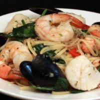 Linguini Pescatore · Shrimp, scallops, clams, rock lobster, bell peppers and spinach sautéed in an olive oil garl...
