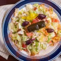 Large Greek Salad · Romaine, sliced tomatoes, cucumbers, red onions, kalamata olives, feta cheese, pepperocinis ...