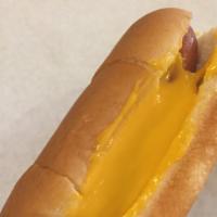 Cheese Dog · Hot dog covered in creamy cheddar cheese sauce. Served on a perfectly steamed bun. Comes wit...