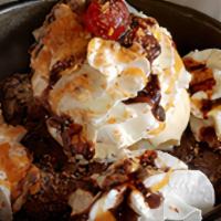 Brownie · triple chocolate brownie with chocolate chips, italian vanilla ice cream, dutch chocolate sy...