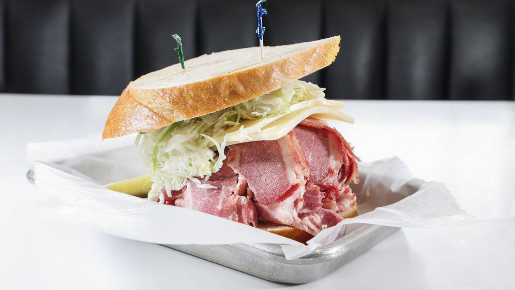 #1 Front Page Special  · Corned beef, coleslaw, Swiss, Russian, on rye.

