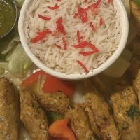 Chicken Kabab · Ground meat with ginger, garlic, onion, seasonings & herbs, roasted to perfection in our cla...