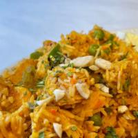 Chicken Biryani(Halal) · Classic Mughlai dish of curried chicken in rice.