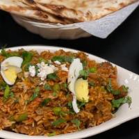 Lamb Biryani(Halal) · Classic Mughlai dish of curried lamb in rice.