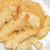 Shrimp Tempura · Japanese sweet potato, zucchini, onions, broccoli, and tempura dipping sauce.