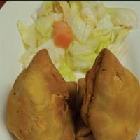 Samosa (Vegetable) · Potato & green pees stuffed in Indian pastry and deep fried.
