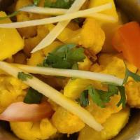 Aloo Gobi · Potato and cauliflower seasoned with spices, garlic and ginger.