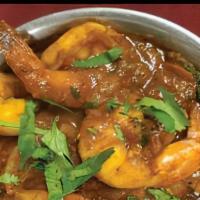 King Prawn Vindaloo · A fairly hot dish, for the lovers of hot spicy food, a delicious combination of vinegar, pot...