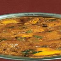 Rogonjosh · Chunks of meat cooked with a gravy based on browned onions or shallots, yogurt, garlic, ging...