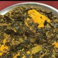 Saag · Meat cooked with curried spinach with touch of fresh cream.