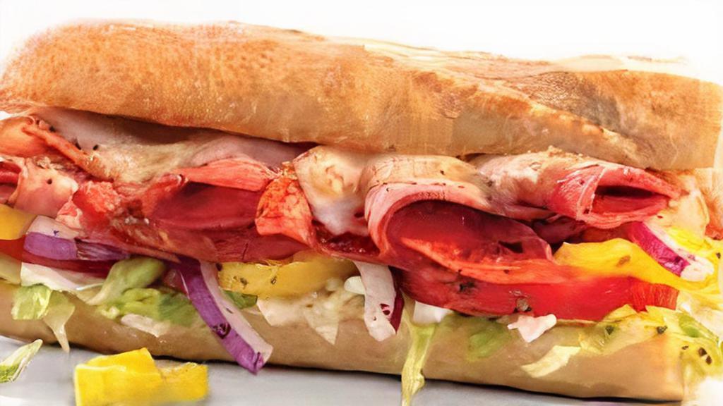 The 1935 Italian Classic · Salami, sandwich pepperoni, and hot ham served on an Italian hoagie, topped with provolone cheese, lettuce, tomato, onion, banana peppers, and Italian dressing.