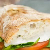 Chicken Pesto Melt · Breaded chicken breast with melted baby swiss cheese topped with fresh tomato and our signat...