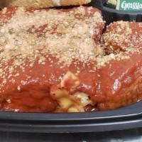 Ultimate Scimeca Sampler · Cheese Lasagna topped with our homemade spaghetti sauce, Chicken Parmesan, and Italian sausa...