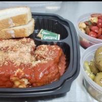 Chico Sampler · A hearty piece of cheese lasagna topped with homemade spaghetti sauce, meatballs, and sliced...