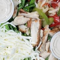 Fajita Chicken Salad · Love fajitas, but not the calories? This Fajita Salad is for you. Fresh lettuce, corn, olive...