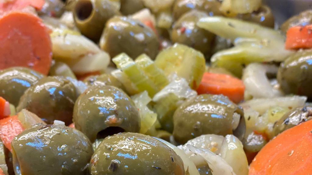 Italian Olive Salad (1 Lb.) · Scimeca's Olive Salad. Green pitted Sicilian olives marinated in olive oil, fresh cut celery, bright orange carrots tossed in olive oil, garlic, herbs and spices for a robust flavor.