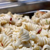 Pasta Salad (1 Lb.) · House made Pasta Salad with carrots, celery, black olives, parmesan cheese and roasted red p...