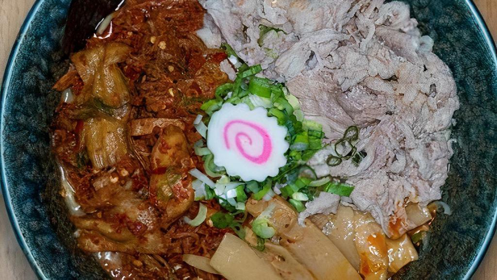 Kimchi Ramen /  キムチラーメン · Hot. Sliced Beef, Fish Cake, Kimchi, Bamboo Shoot, Green Onion, Spicy Oil & Black Garlic Oil In Spicy Tonkotsu Broth.